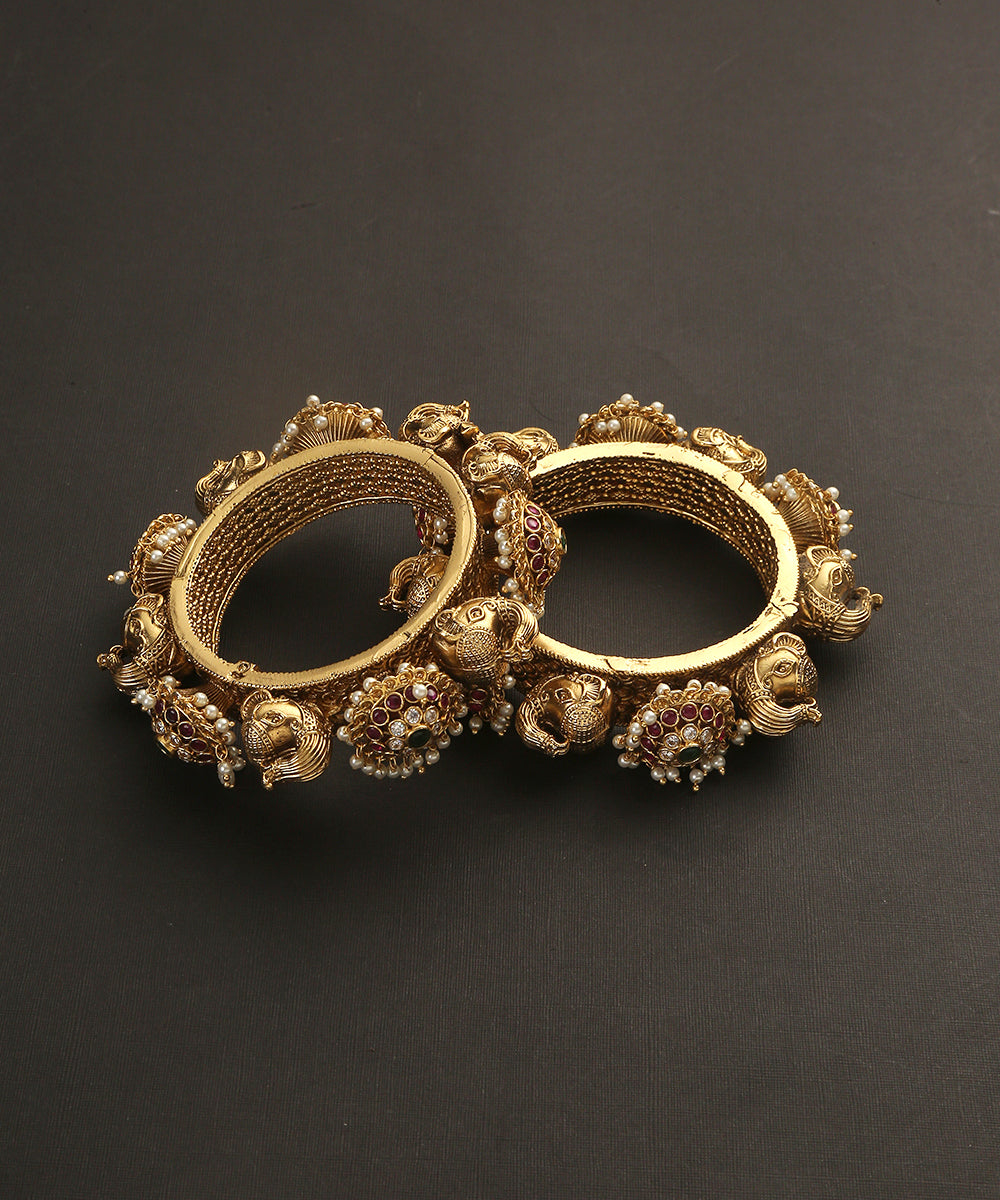 Jana_Handcrafted_Golden_Bangles_With_Peacock_And_Floral_Motifs_WeaverStory_02