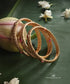 Ruba_Handcrafted_Gold_Plated_Alloy_Bangles_Set_Of_3_WeaverStory_01