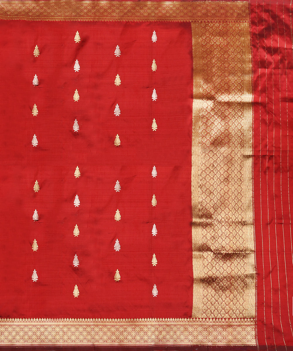 Full view of maroon pure Katan silk Banarasi dupatta with gold zari leaf bootis, a geometric border and lattice-patterned palla.