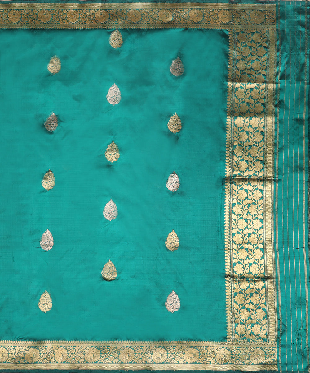 Full view of green handloom Katan silk dupatta featuring evenly placed gold zari leaf bootis and ornate floral borders.