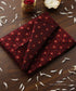 Maroon_And_Black_Handloom_Pure_Katan_Silk_Tanchoi_Banarasi_Fabric_With_Zari_Booti_WeaverStory_01