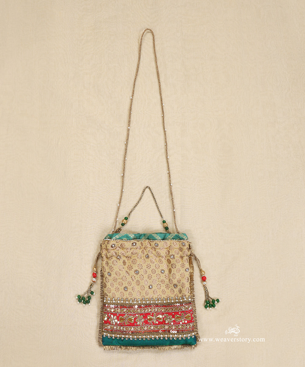 Golden_And_Red_Brocade_Potli_With_Embroidery_WeaverStory_03