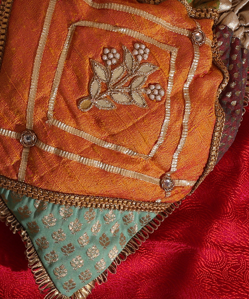 Multicoloured Brocade Potli With 4 Corner Brocade And Woven Bootas