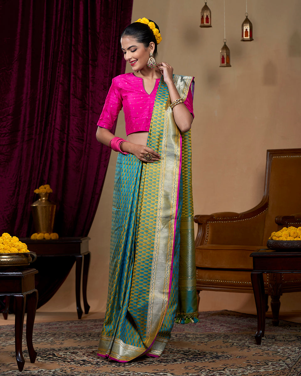 Light Green Handloom Pure Katan Silk Tanchoi Banarasi Saree With Teal Leaf Motifs