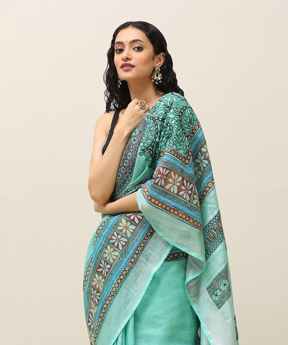 Sea_Green_Handloom_Linen_Handpainted_Madhubani_Saree_With_Border_WeaverStory_02