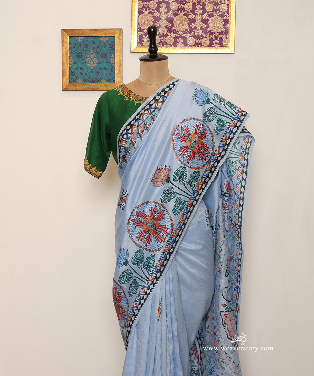 Shoulder drape showing circular fish motifs and intricate Madhubani painting on sky blue Chanderi