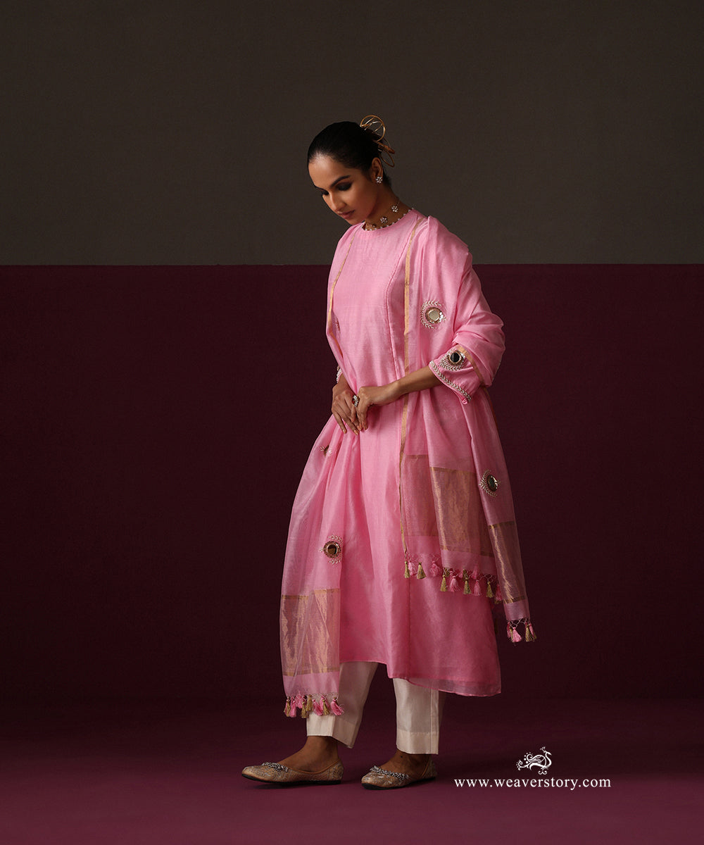 Full-length view of the flared pink Chanderi kurta with straight ivory pants
