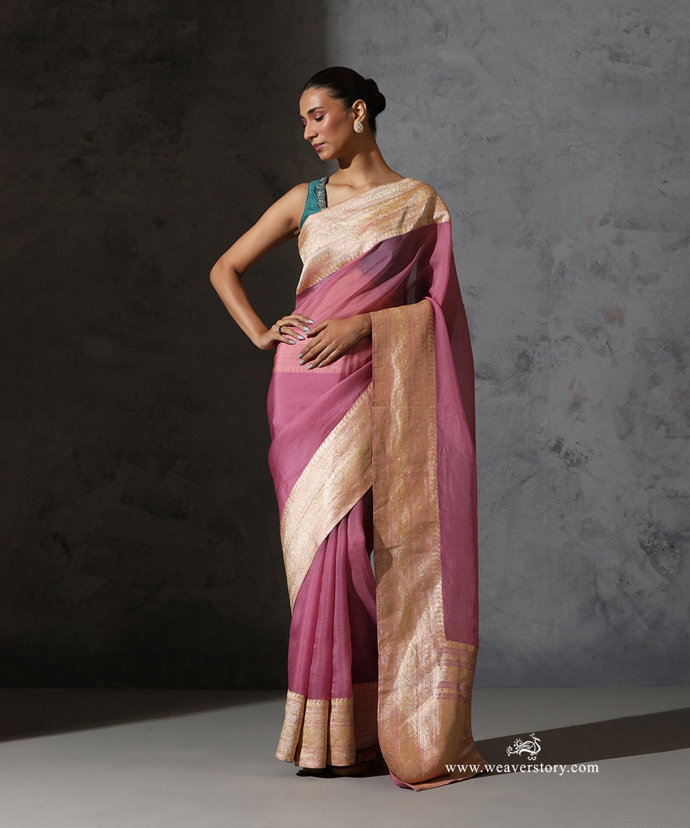 Full-length front view of Mrignayani light pink pure silk organza saree with vintage gold zari Banarasi border.
