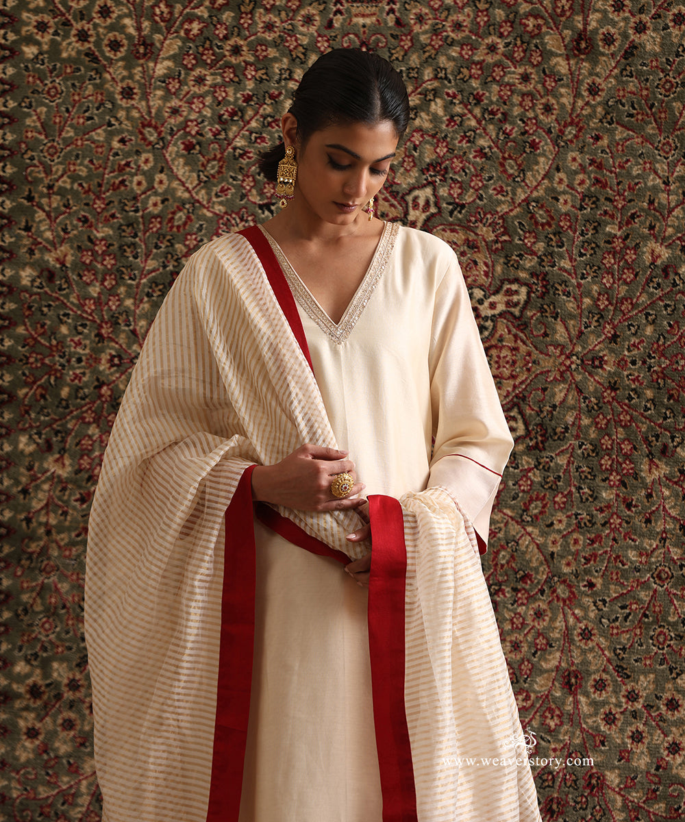 Off White Chanderi Silk Kurta Set with Hand Embroidered Neckline and Red Stripe Tissue Pants