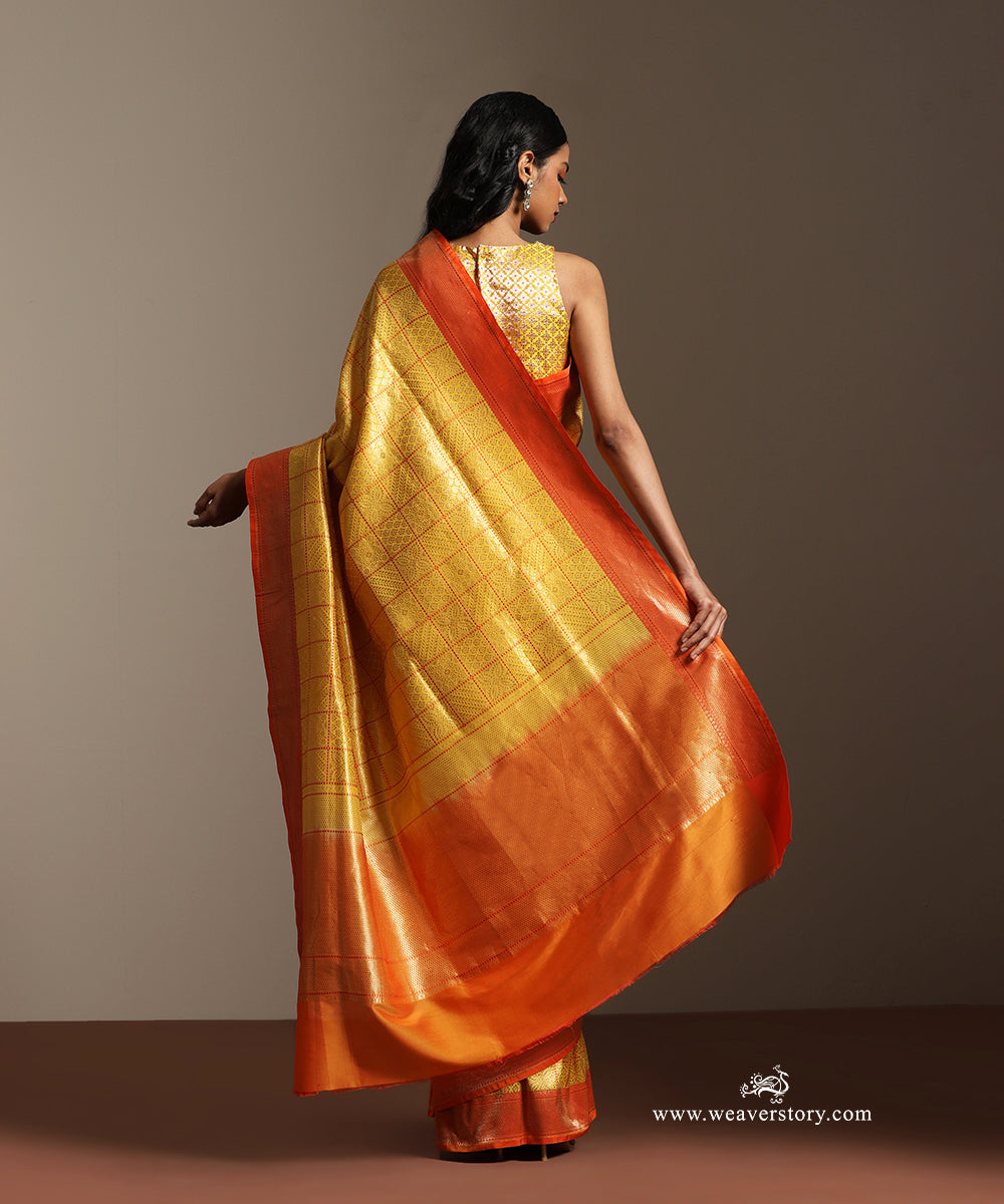 Yellow_Banarasi_Brocade_Saree_With_Orange_Contrast_Border_WeaverStory_03