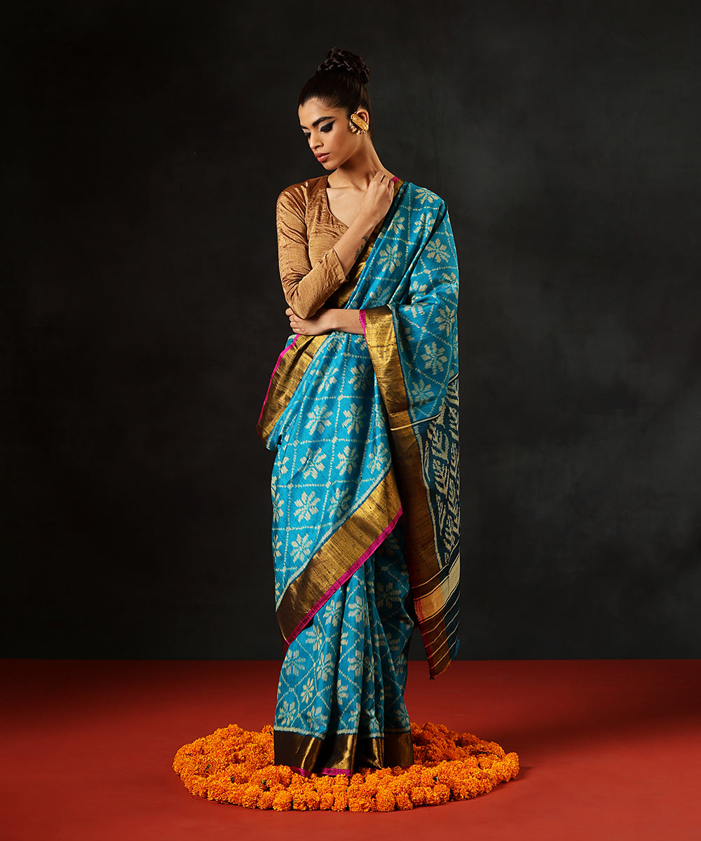 Aqua Blue Handloom Raw Silk Single Ikat Patola Saree With Gold Tissue Border