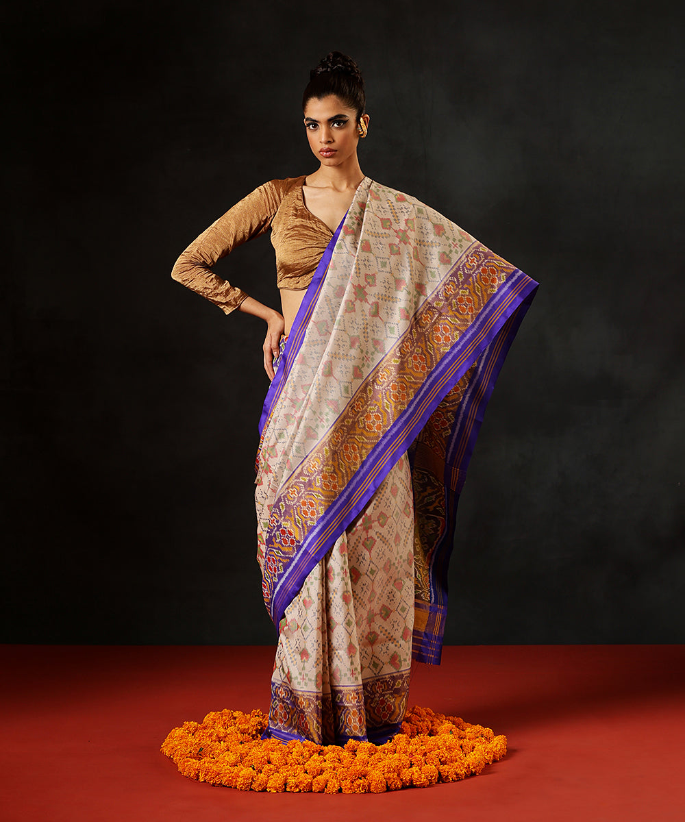 Off White Double Shade Handloom Pure Mulberry Silk Single Ikat Patola Saree With Blue Tissue Border