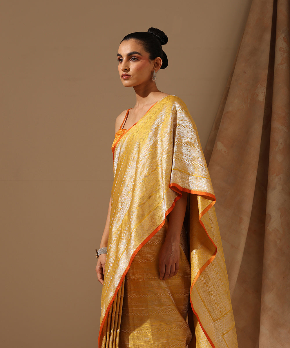Yellow_Handloom_Pure_Satin_Silk_Kimkhab_Banarasi_Saree_With_Orange_Selvedge_WeaverStory_01