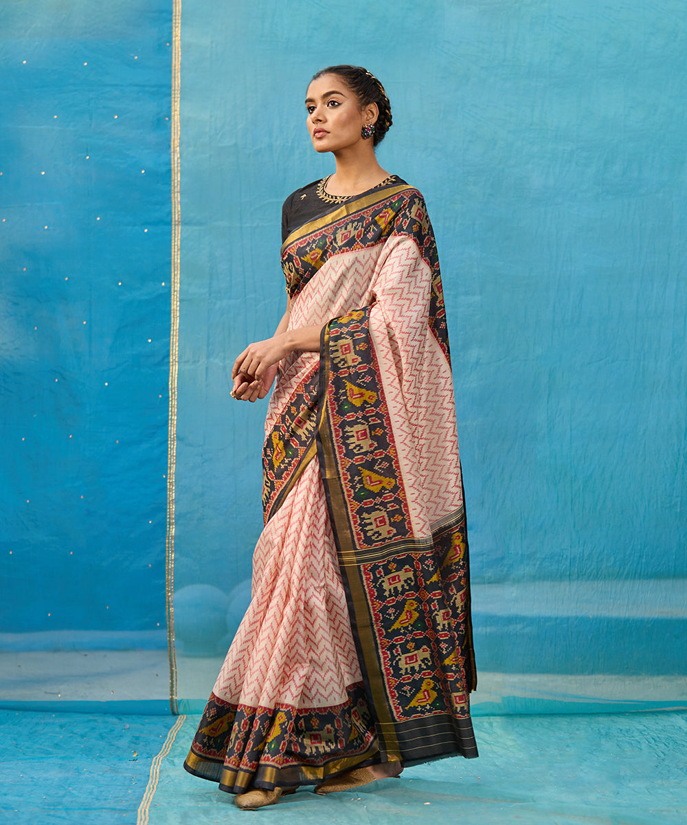 Handloom_White_And_Red_Pure_Mulberry_Silk_Ikat_Patola_Saree_With_Black_Border_And_Palla_WeaverStory_01
