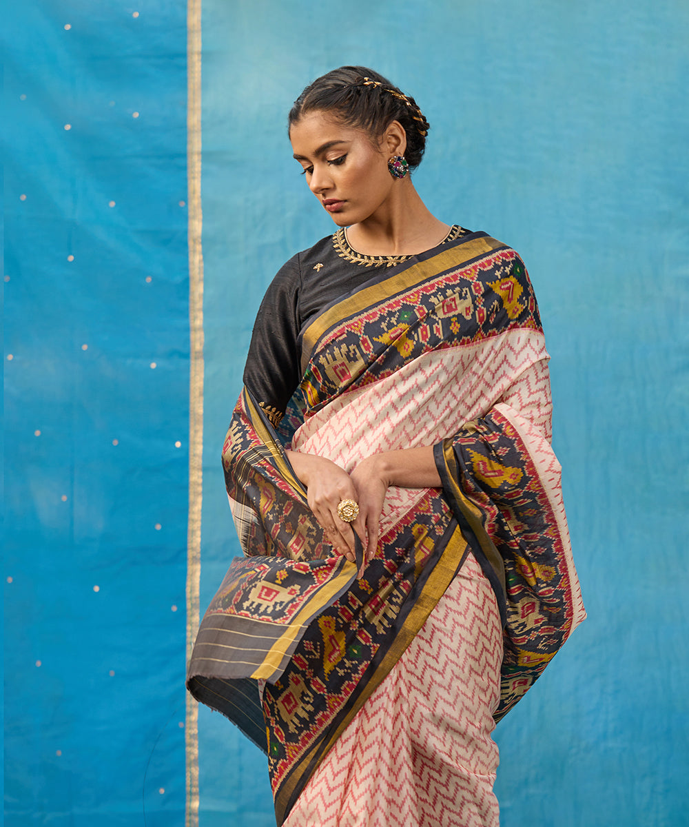 Handloom_White_And_Red_Pure_Mulberry_Silk_Ikat_Patola_Saree_With_Black_Border_And_Palla_WeaverStory_02