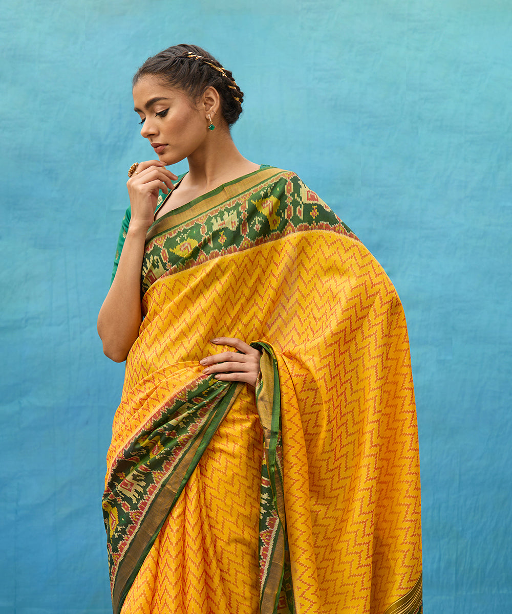 Yellow_And_Green_Handloom_Pure_Mulberry_Silk_Ikat_Patola_Saree_WeaverStory_02
