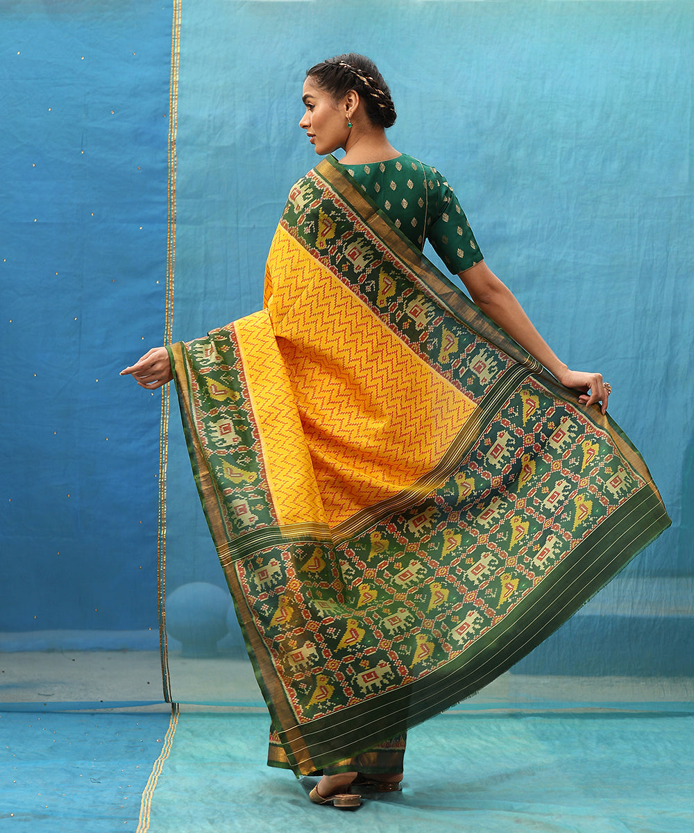 Yellow_And_Green_Handloom_Pure_Mulberry_Silk_Ikat_Patola_Saree_WeaverStory_03