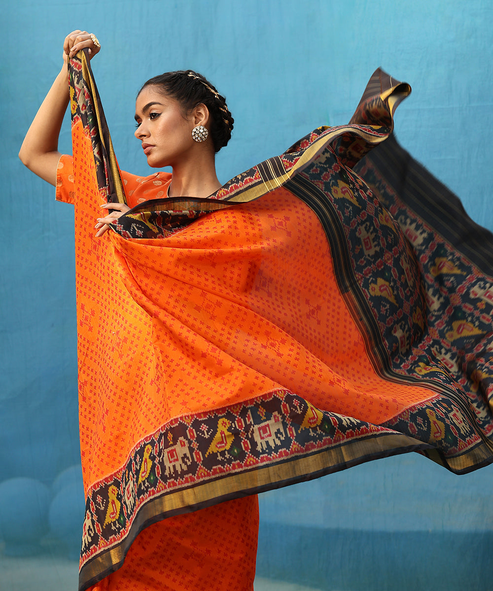 Orange_And_Black_Handloom_Pure_Mulberry_Silk_Ikat_Patola_Saree_With_Black_Border_And_Palla_WeaverStory_02