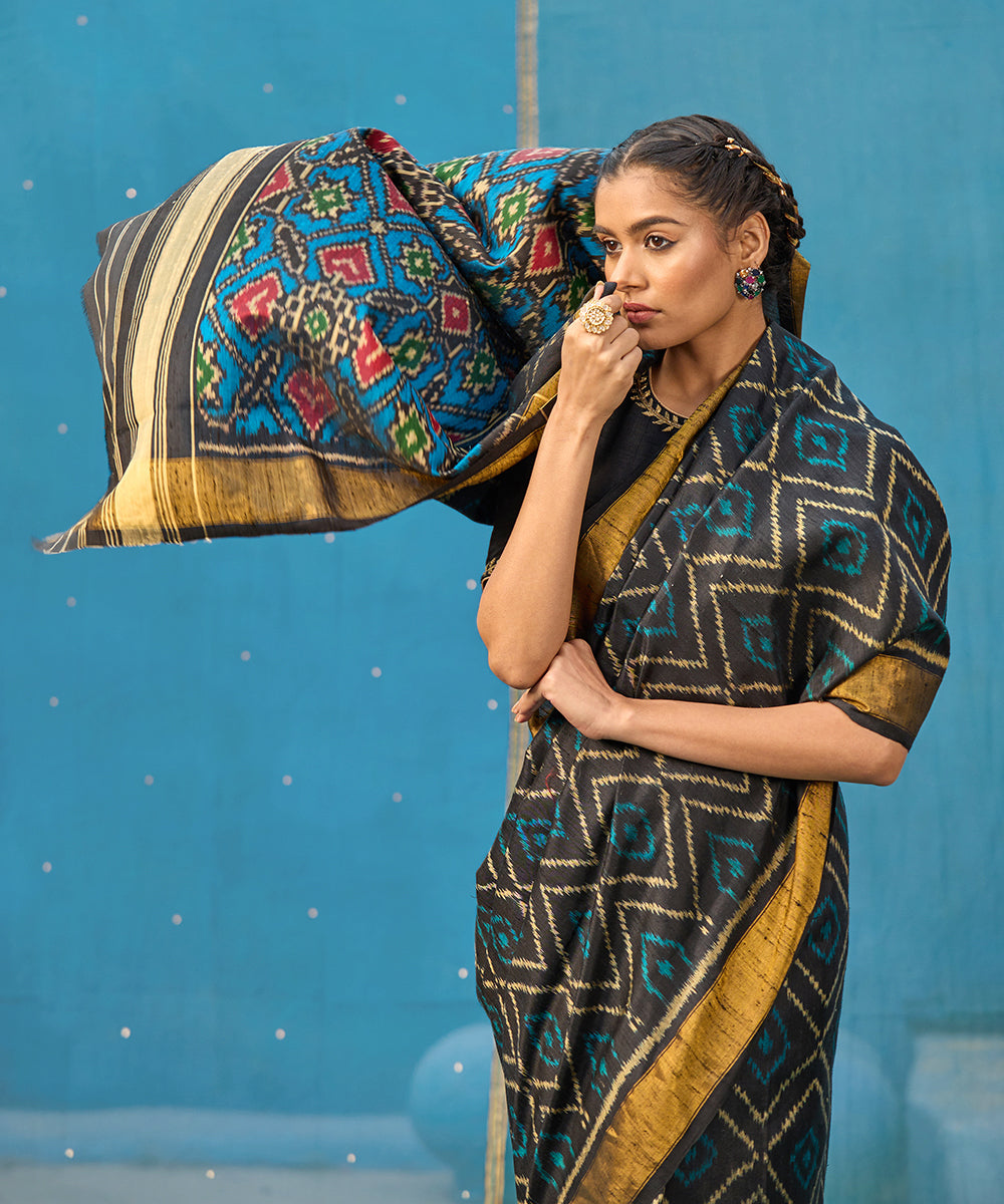 Blue_And_Black_Handloom_Pure_Raw_Silk_Ikat_Patola_Saree_With_Tissue_Border_WeaverStory_02