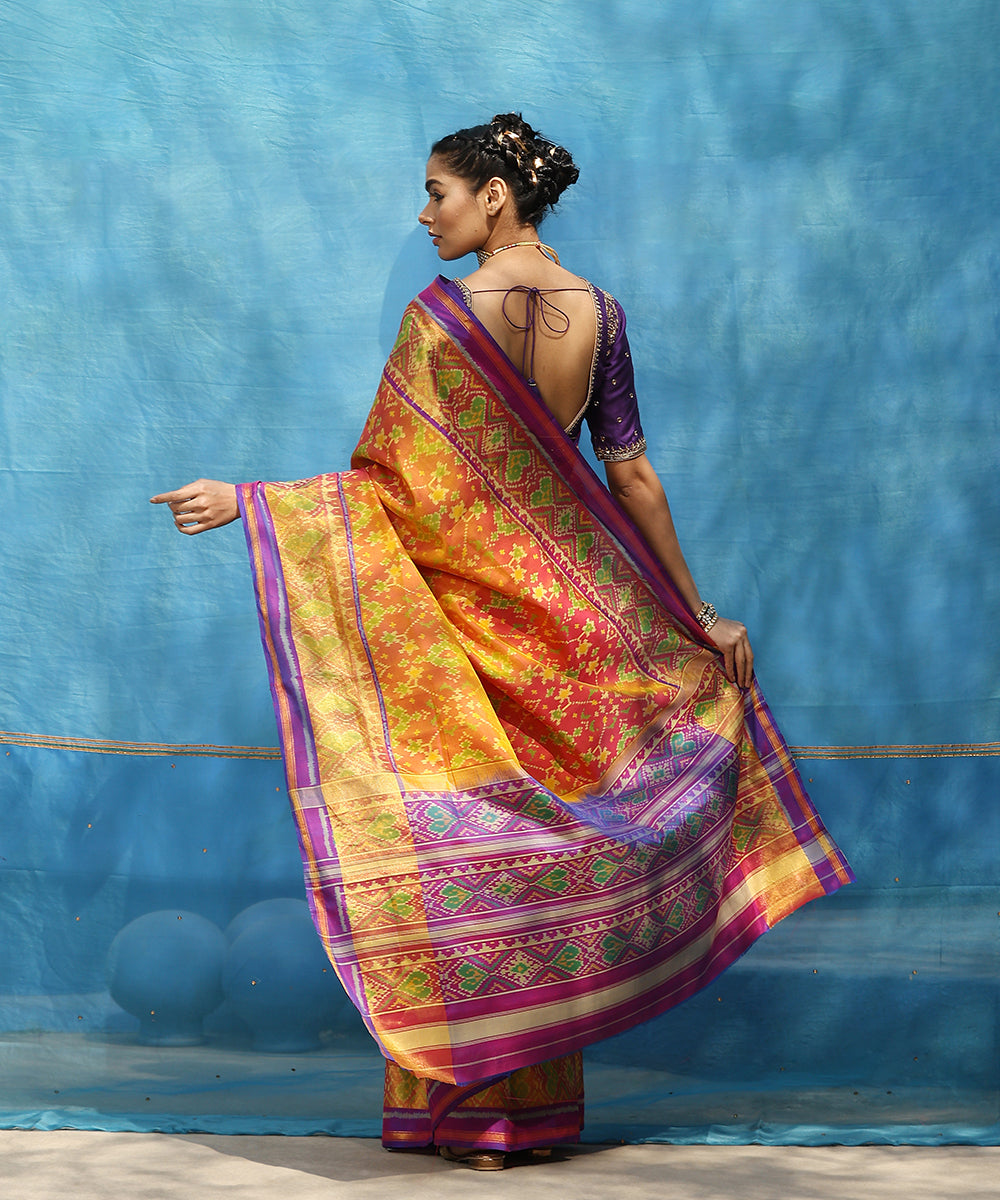 Peach_And_Purple_Handloom_Pure_Mulberry_Silk_Ikat_Patola_Saree_WeaverStory_03