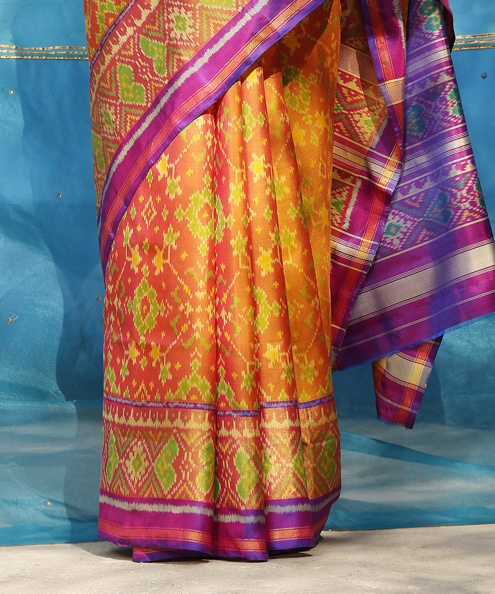 Peach_And_Purple_Handloom_Pure_Mulberry_Silk_Ikat_Patola_Saree_WeaverStory_04