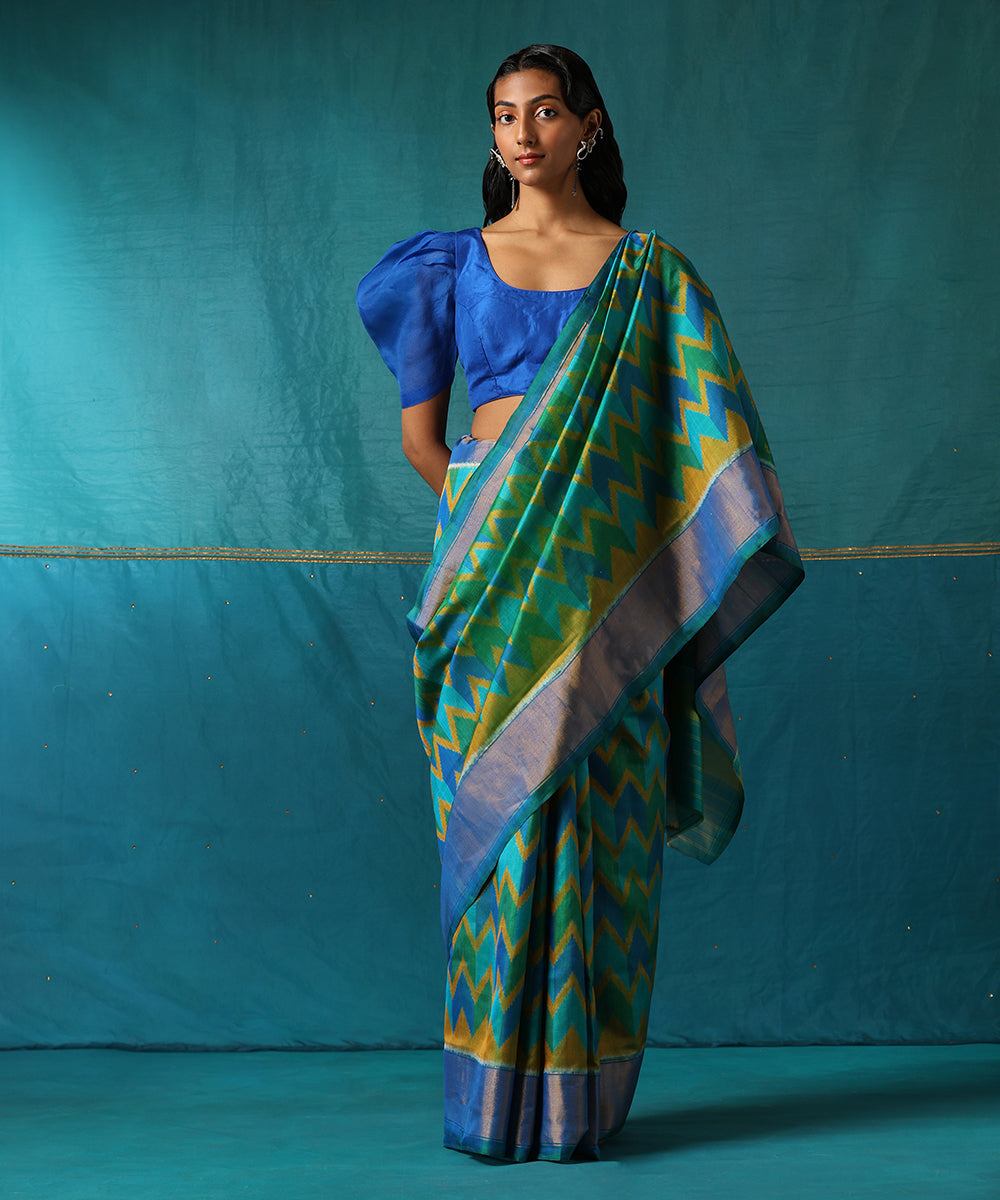 Handloom_Green_And_Blue_Pure_Mulberry_Silk_Ikat_Patola_Saree_With_Zari_Border_WeaverStory02