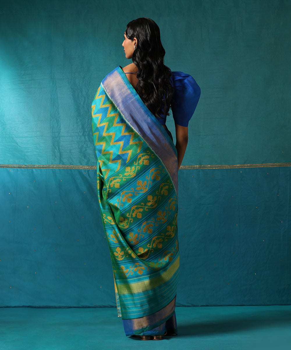 Handloom_Green_And_Blue_Pure_Mulberry_Silk_Ikat_Patola_Saree_With_Zari_Border_WeaverStory03