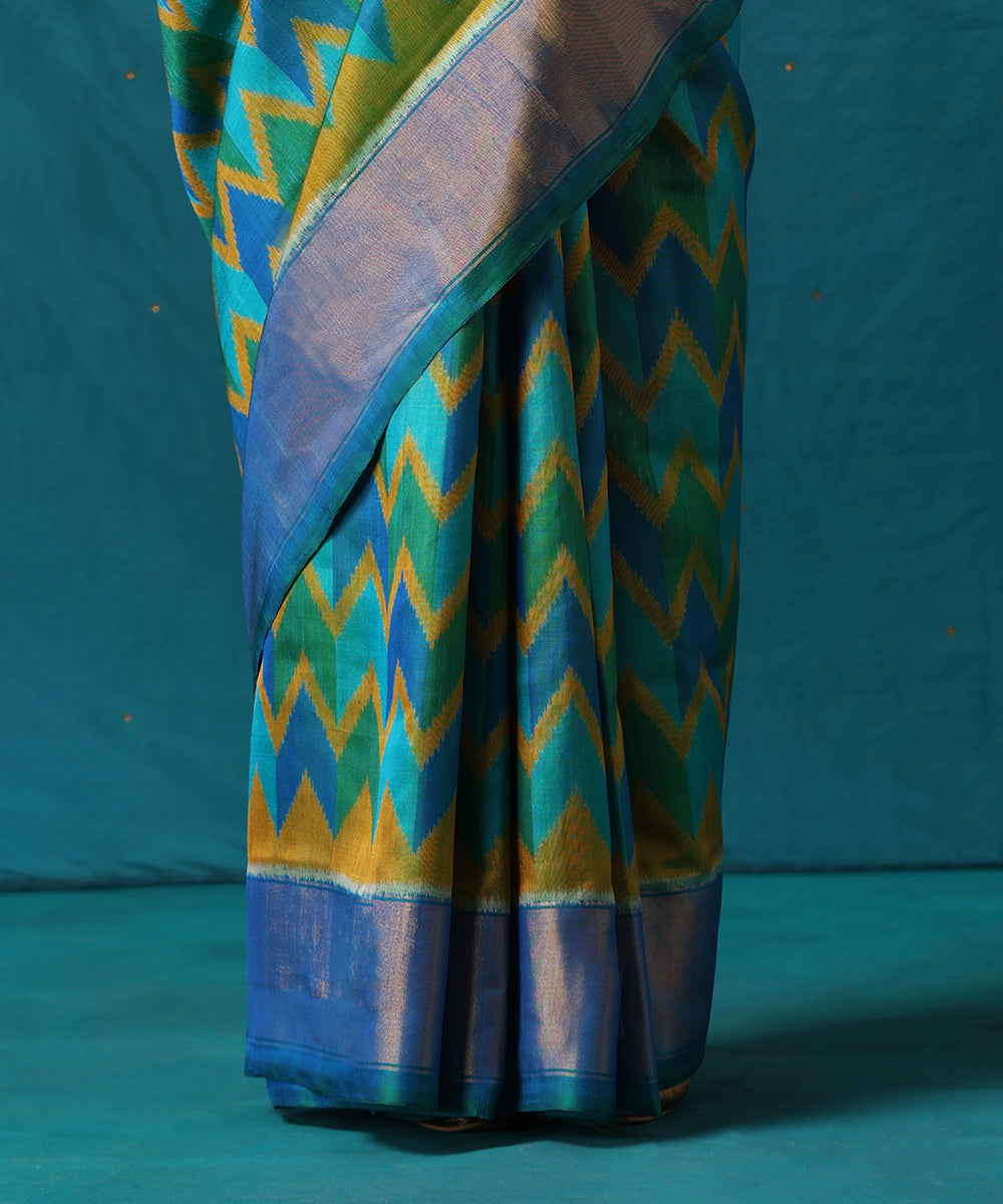 Handloom_Green_And_Blue_Pure_Mulberry_Silk_Ikat_Patola_Saree_With_Zari_Border_WeaverStory04