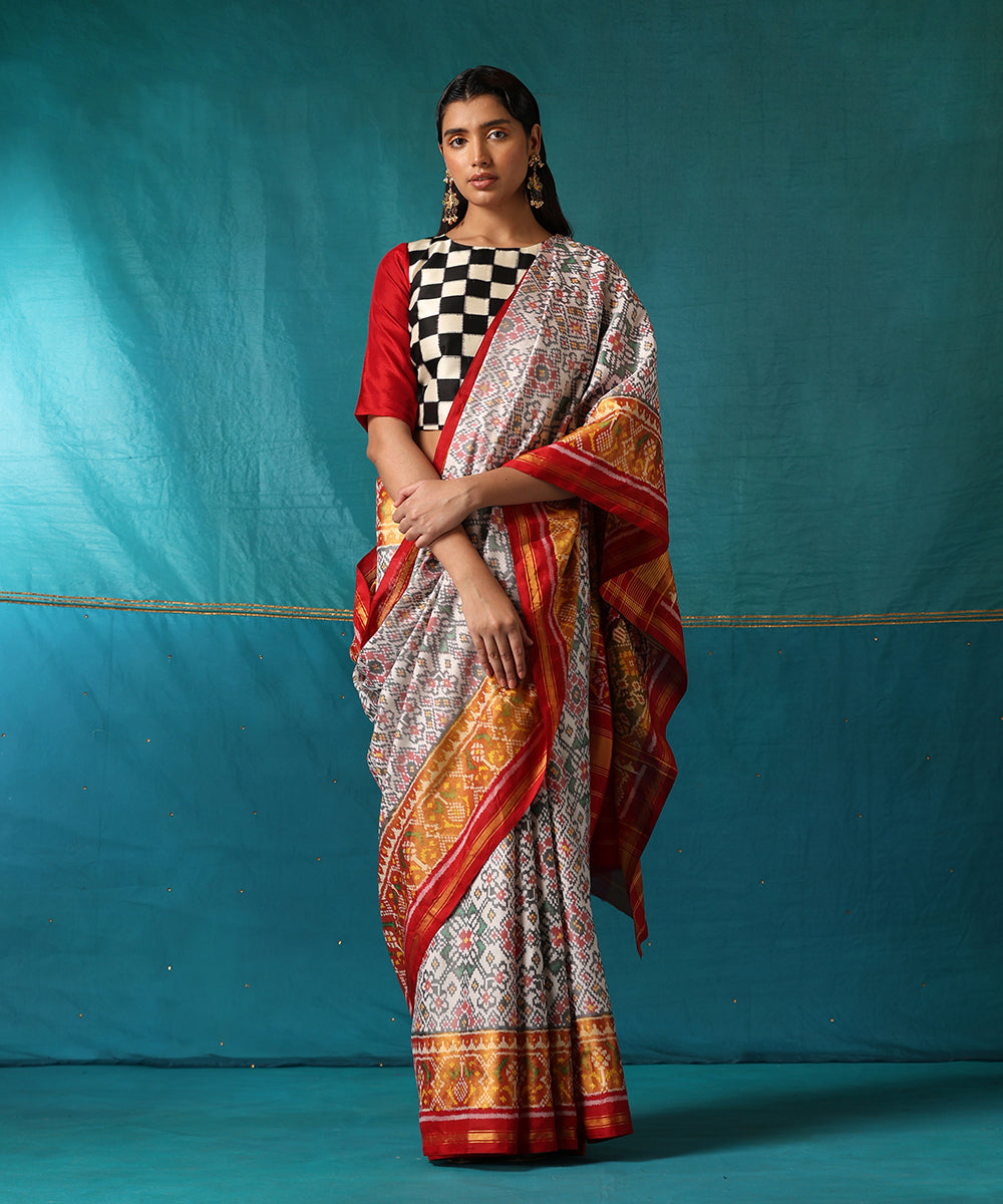 Handloom_White_And_Red_Pure_Mulberry_Silk_Ikat_Patola_Saree_With_Red_Border_WeaverStory02