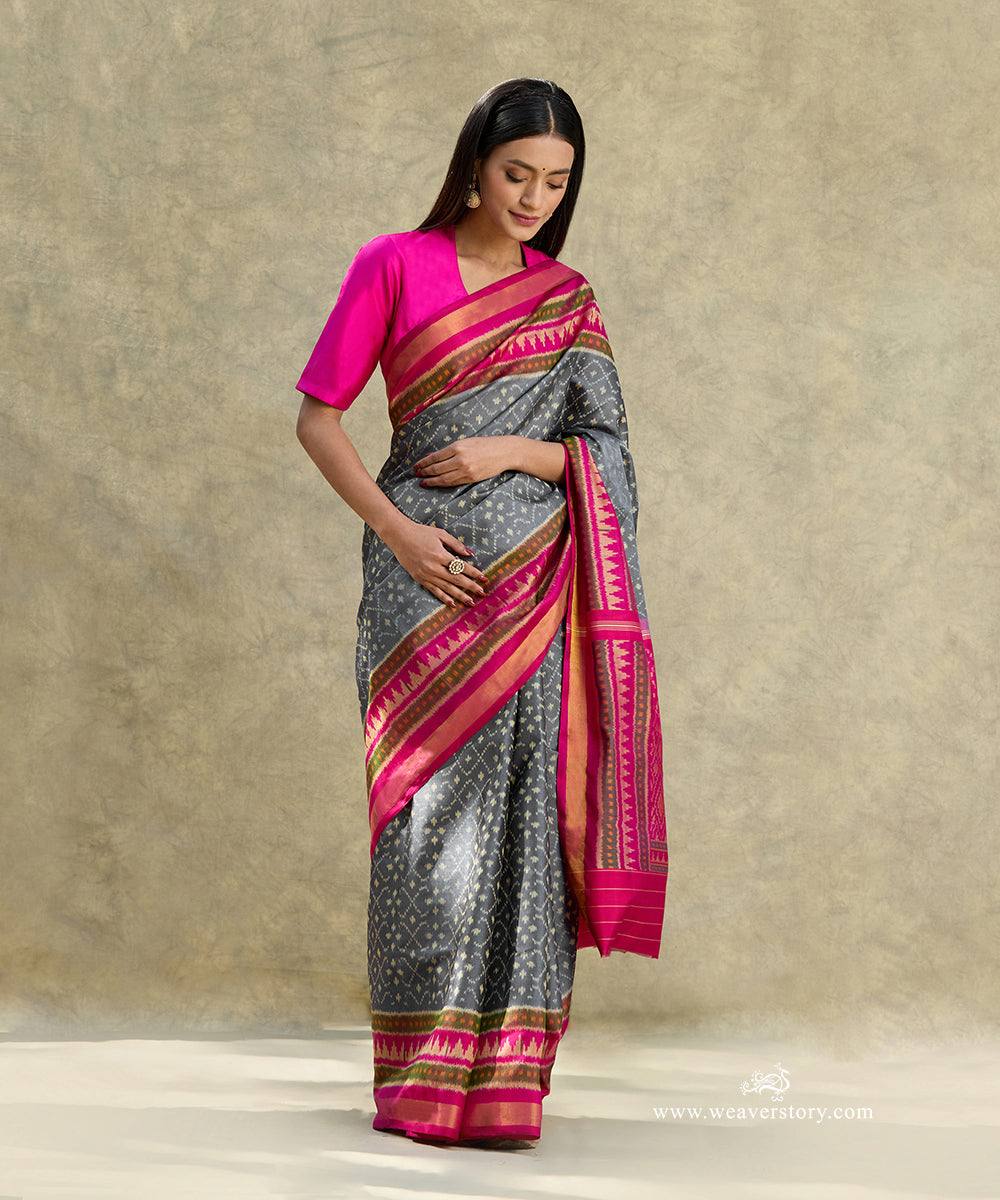 Handloom_Dark_Grey_Pure_Mulberry_Silk_Ikat_Patola_Saree_With_Pink_Border_And_Pallu_WeaverStory_01