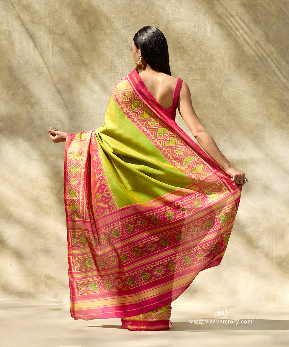 Handloom_Lemon_Green_Plain_Pure_Mulberry_Silk_Ikat_Patola_Saree_Rani_Pink_Border_Pallu_WeaverStory_03