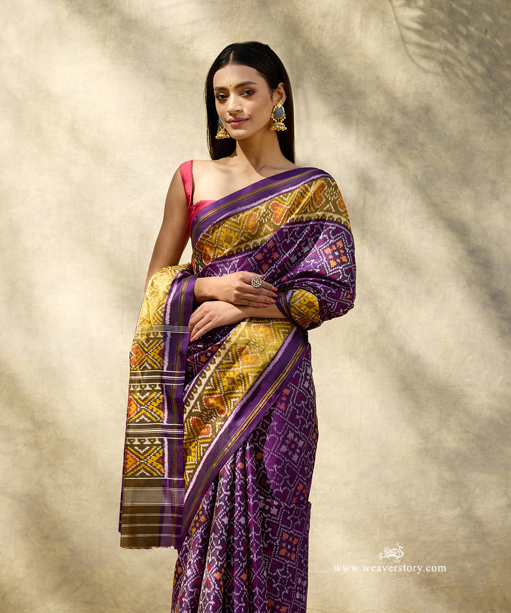 Purple_Handloom_Pure_Mulberry_Silk_Traditional_Ikat_Patola_Saree_With_Tissue_Border_WeaverStory_02