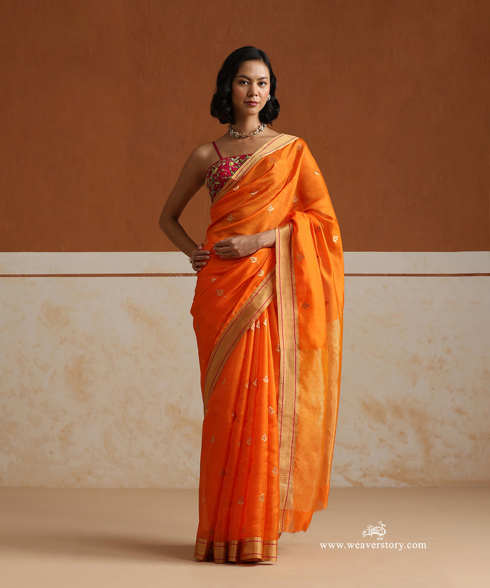 Handloom_Orange_Pure_Silk_Chanderi_Saree_With_Pink_Meena_Flower_Motifs_And_Gold_Zari_Border_With_Pink_Line_WeaverStory_01