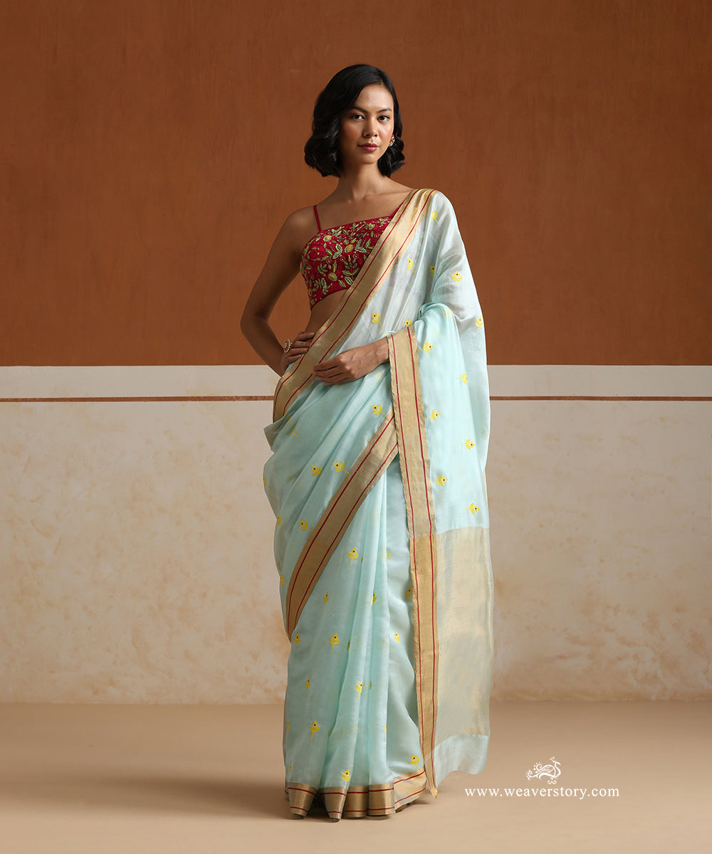 Handloom_Ice_Blue_Pure_Silk_Chanderi_Saree_With_Yellow_Meena_Flower_Motifs_And_Gold_Zari_Border_With_Maroon_Lines_WeaverStory_02