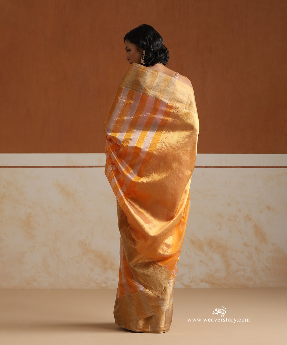 Handloom_Peach_And_Yellow_Striped_Pure_Silk_Chanderi_Saree_With_Heavy_Saffron_Border_WeaverStory_03