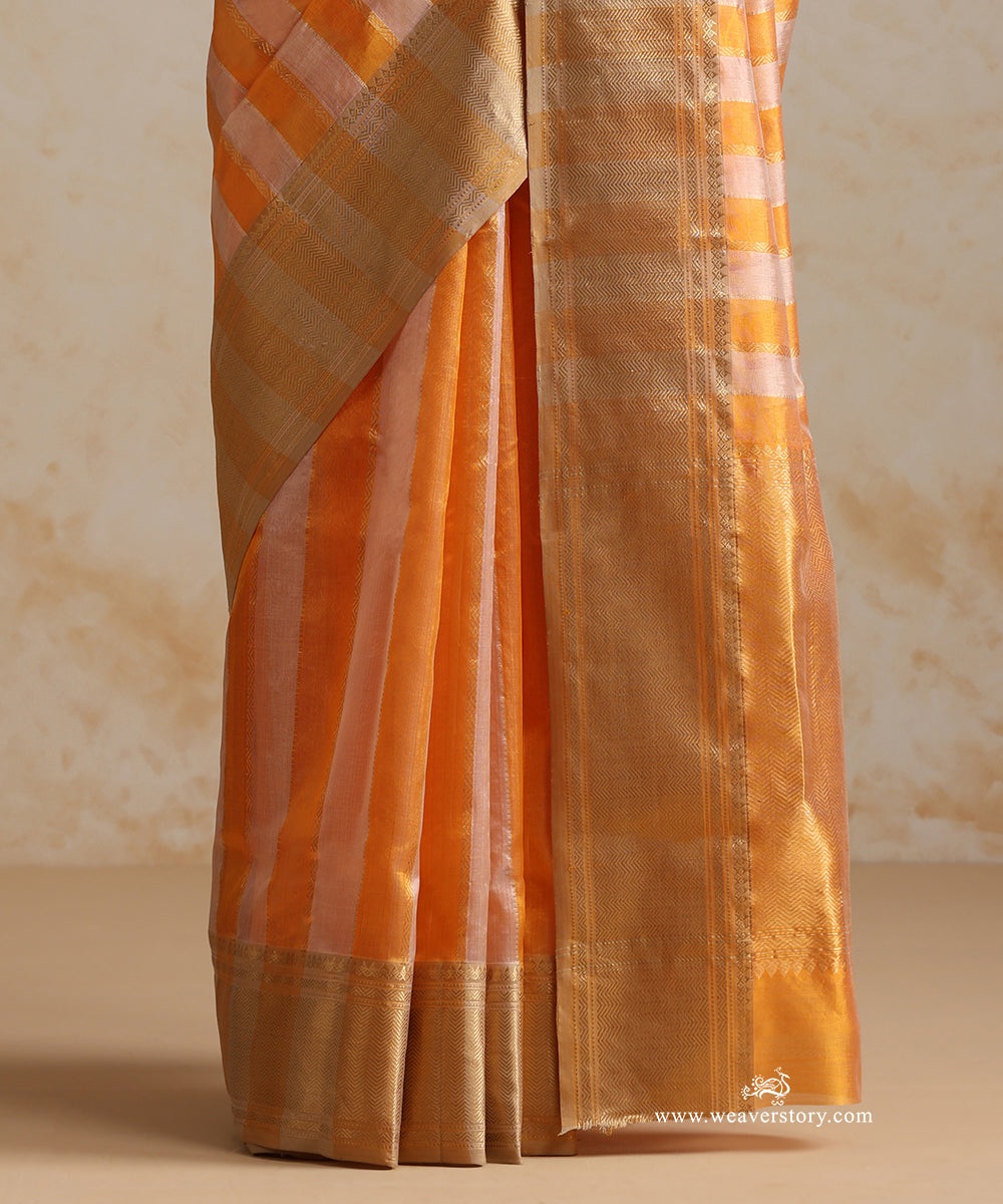 Handloom_Peach_And_Yellow_Striped_Pure_Silk_Chanderi_Saree_With_Heavy_Saffron_Border_WeaverStory_04