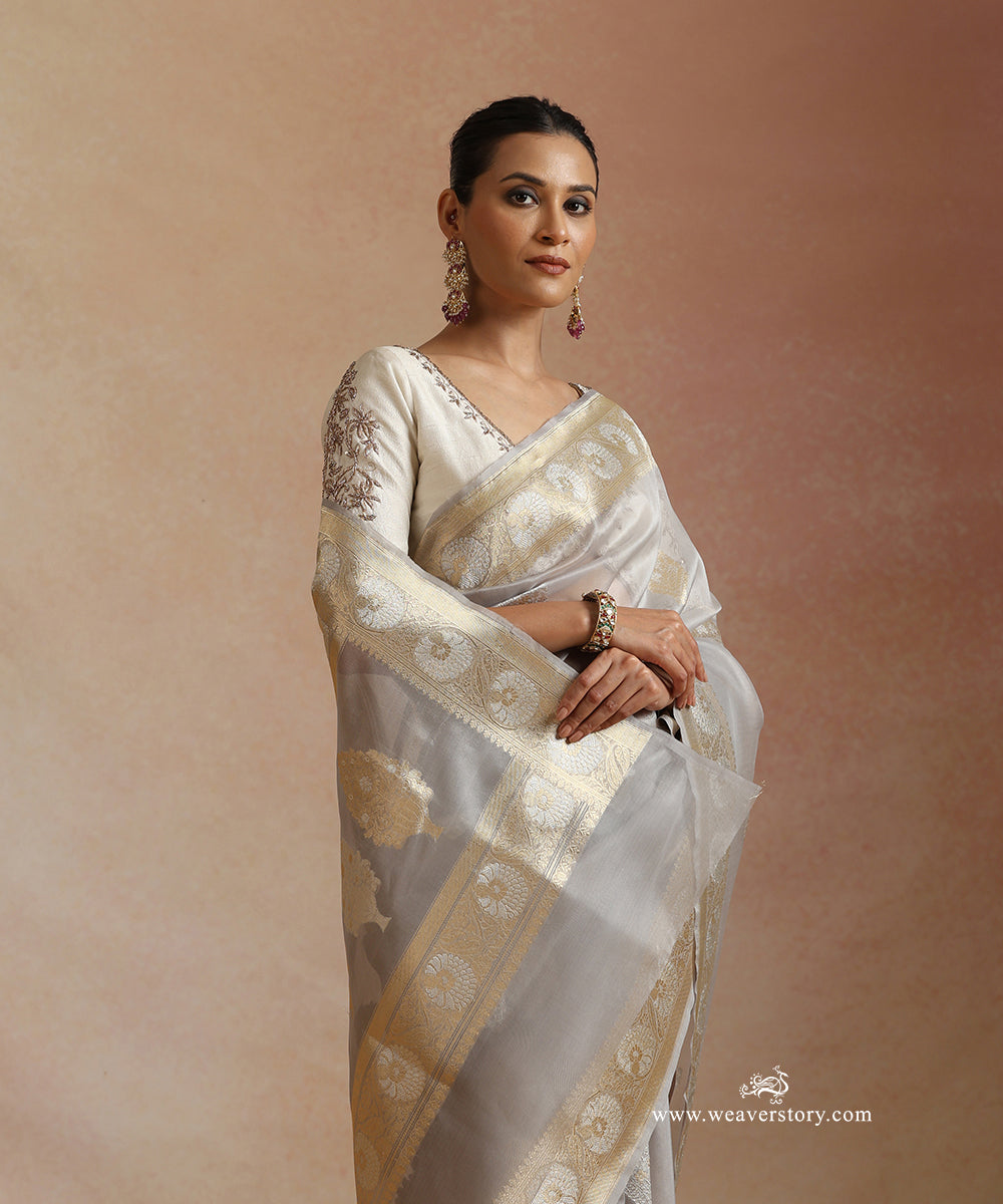 Gray_Handloom_Pure_Kora_Silk_Banarasi_Saree_With_Kadhwa_Ambi_Boota_With_Gold_And_Silver_Flowers_Bel_WeaverStory_01