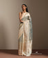 Pastel_Green_And_Baige_Handloom_Pure_Tissu_Silk_Banarasi_Saree_With_Katan_Silk_Kadiyal_Meenakari_Border_And_Gold_Silver_Motifs_WeaverStory_01