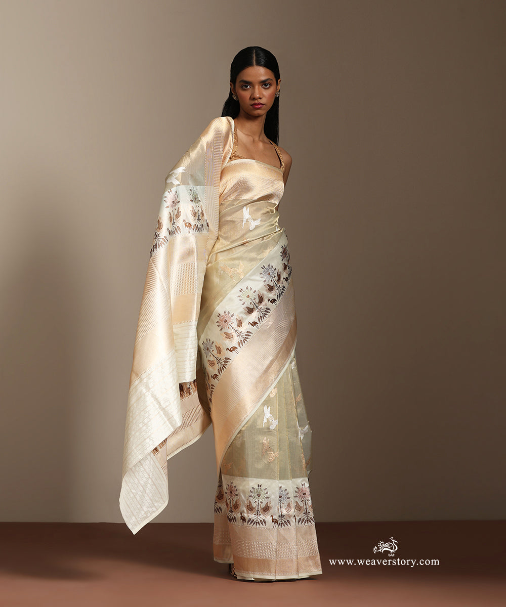 Pastel_Green_Handloom_Pure_Tissue_Silk_Banarasi_Saree_With_Katan_Silk_Kadiyal_Intricate_Resham_Work_Border_And_Small_Birds_Motifs_WeaverStory_01