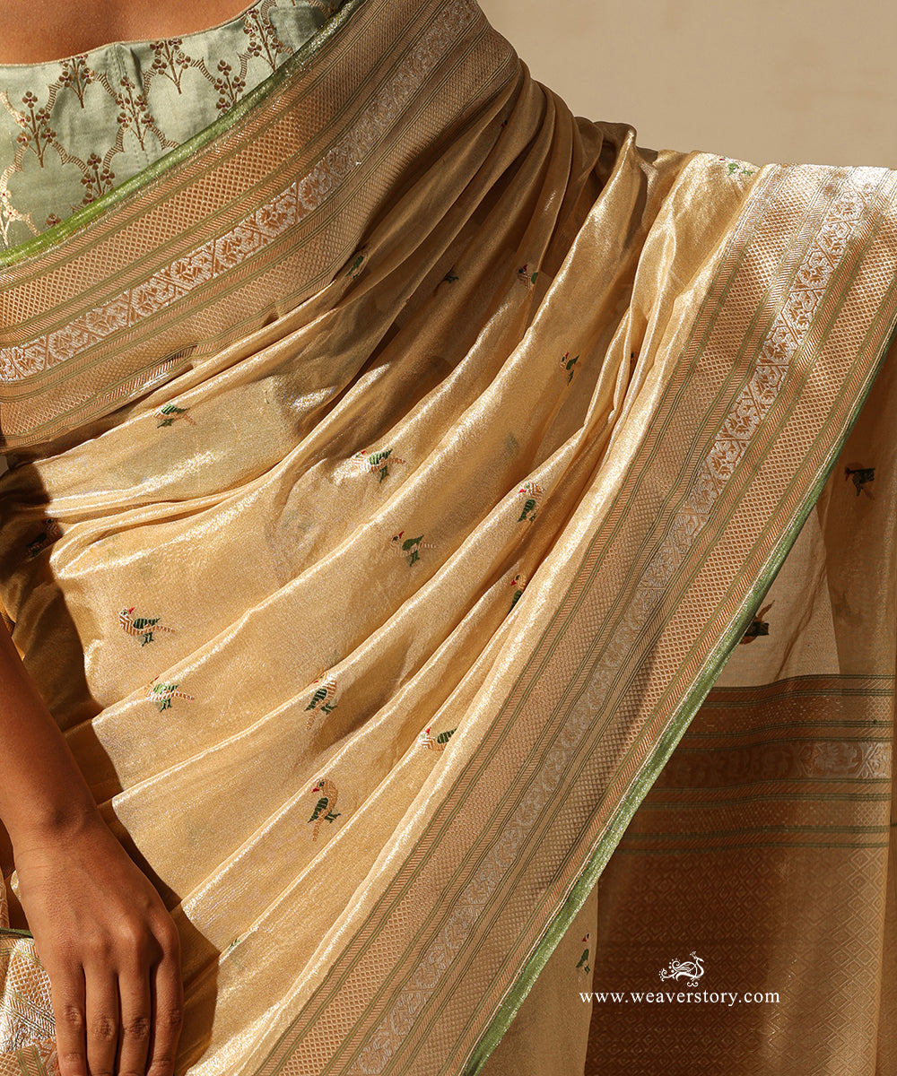 Gold Handloom Pure Tissue Silk Banarasi Saree With Small Parrot Motifs With Pista Meenakari And Selvedge