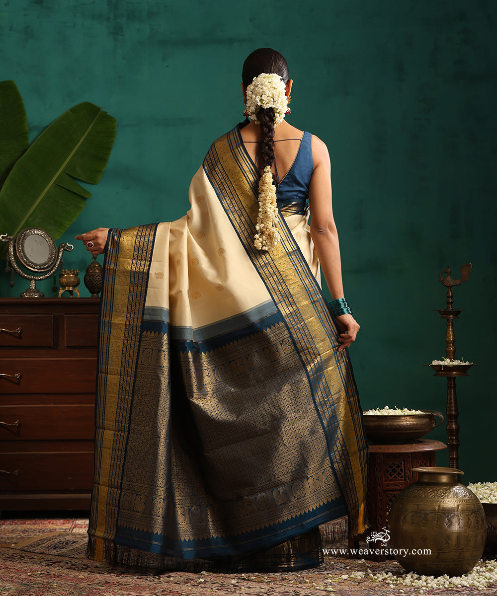 Cream_Handloom_Pure_Silk_Pure_Zari_Kanjivaram_Saree_With_Elephant_Motifs_And_Blue_Korwai_Border_WeaverStory_03