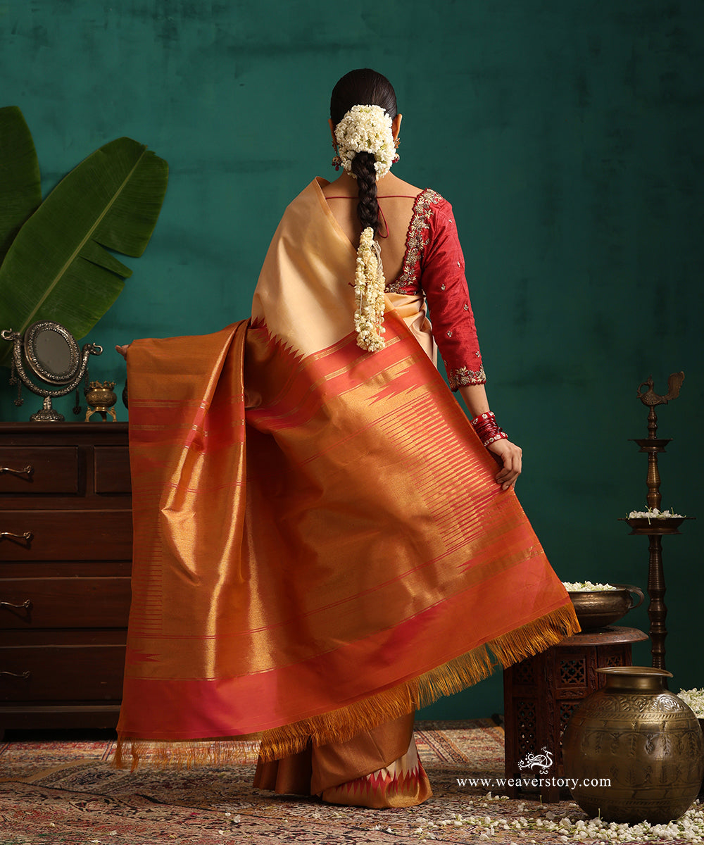 Nude_Pink_Handloom_Pure_Silk_Pure_Zari_Rising_Temple_Kanjivaram_Saree_WeaverStory_03