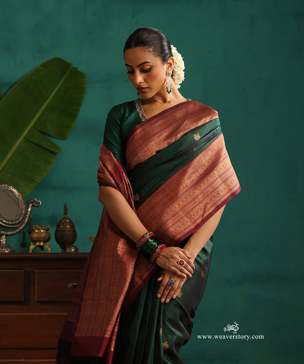 Bottle_Green_Handloom_Pure_Silk_Pure_Zari_Kanjivaram_Saree_With_Ganderberunda_Motifs_And_Wine_Korwai_Border_WeaverStory_02