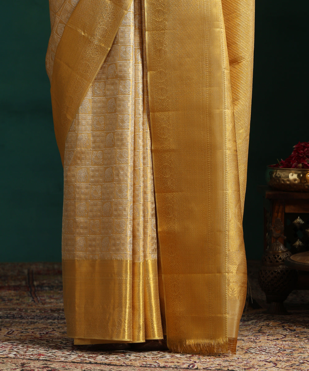 Gold_Pure_Tissue_Silk_Kanjivaram_Saree_With_Gold_Border_WeaverStory_04