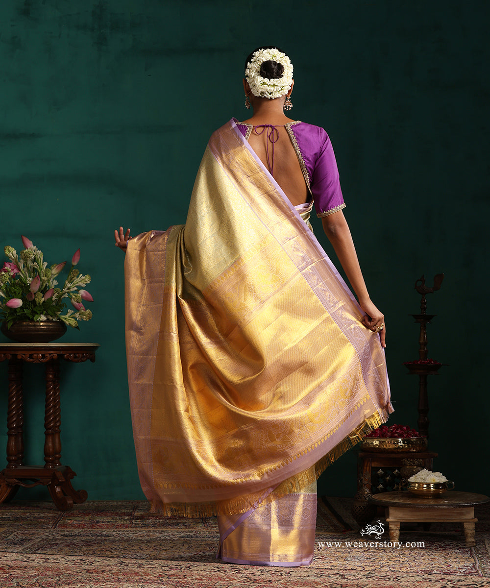 Light_Green_And_Gold_Pure_Silk_Tissue_Kanjivaram_Saree_With_Lilac_Border_WeaverStory_03