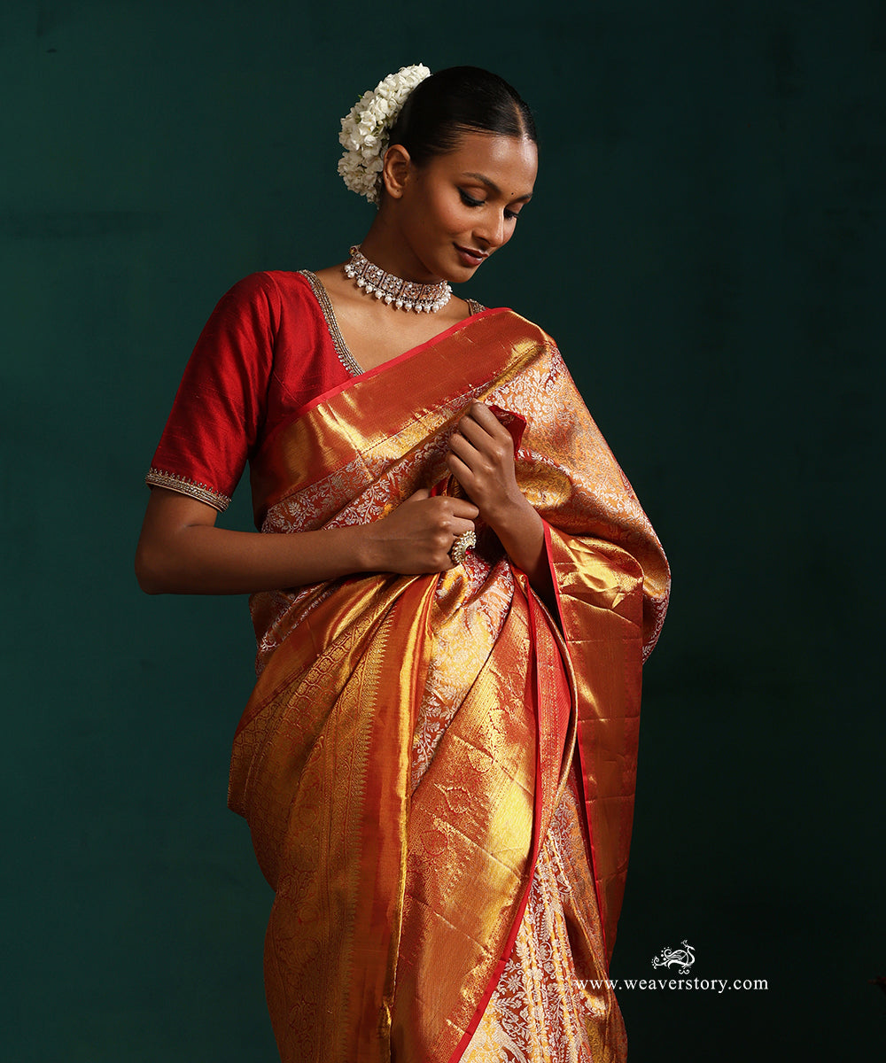 Red_And_Gold_Pure_Silk_Tissue_Kanjivaram_Saree_With_Floral_Jaal_And_Red_Border_WeaverStory_02