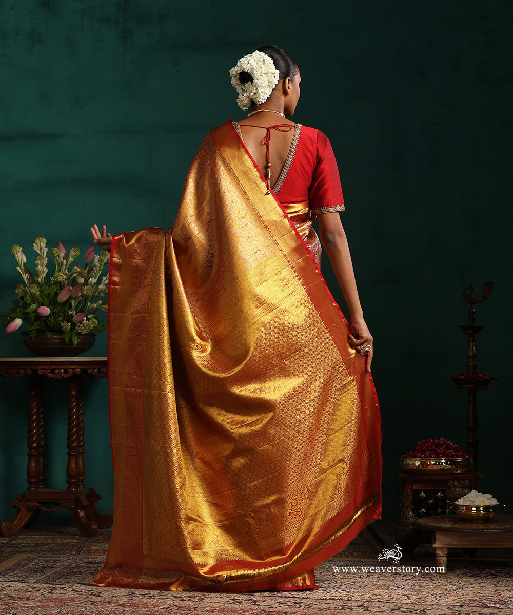 Red_And_Gold_Pure_Silk_Tissue_Kanjivaram_Saree_With_Floral_Jaal_And_Red_Border_WeaverStory_03