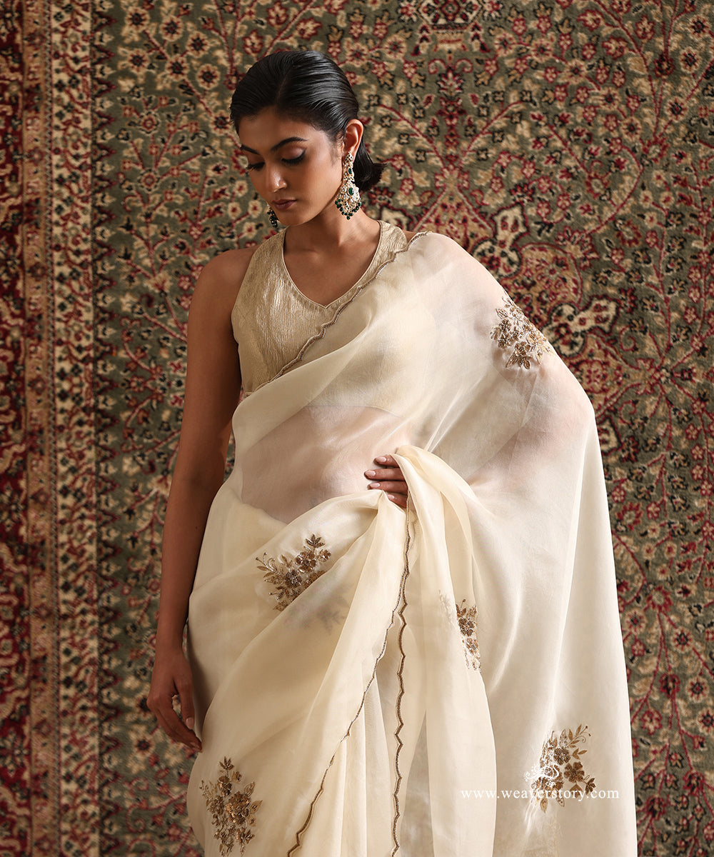 Ivory Off-White Handloom Organza Saree With Cutdana Hand Embroidery from Antara by WeaverStory