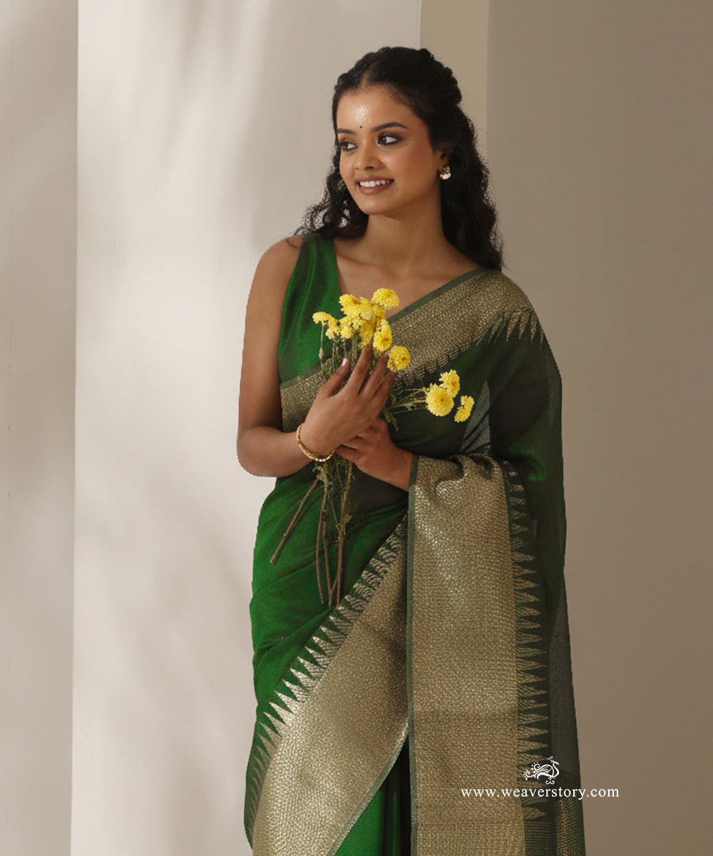 Olive_Green_Handloom_Plain_With_Broad_Border_Cotton_Silk_Chanderi_Saree_WeaverStory_02