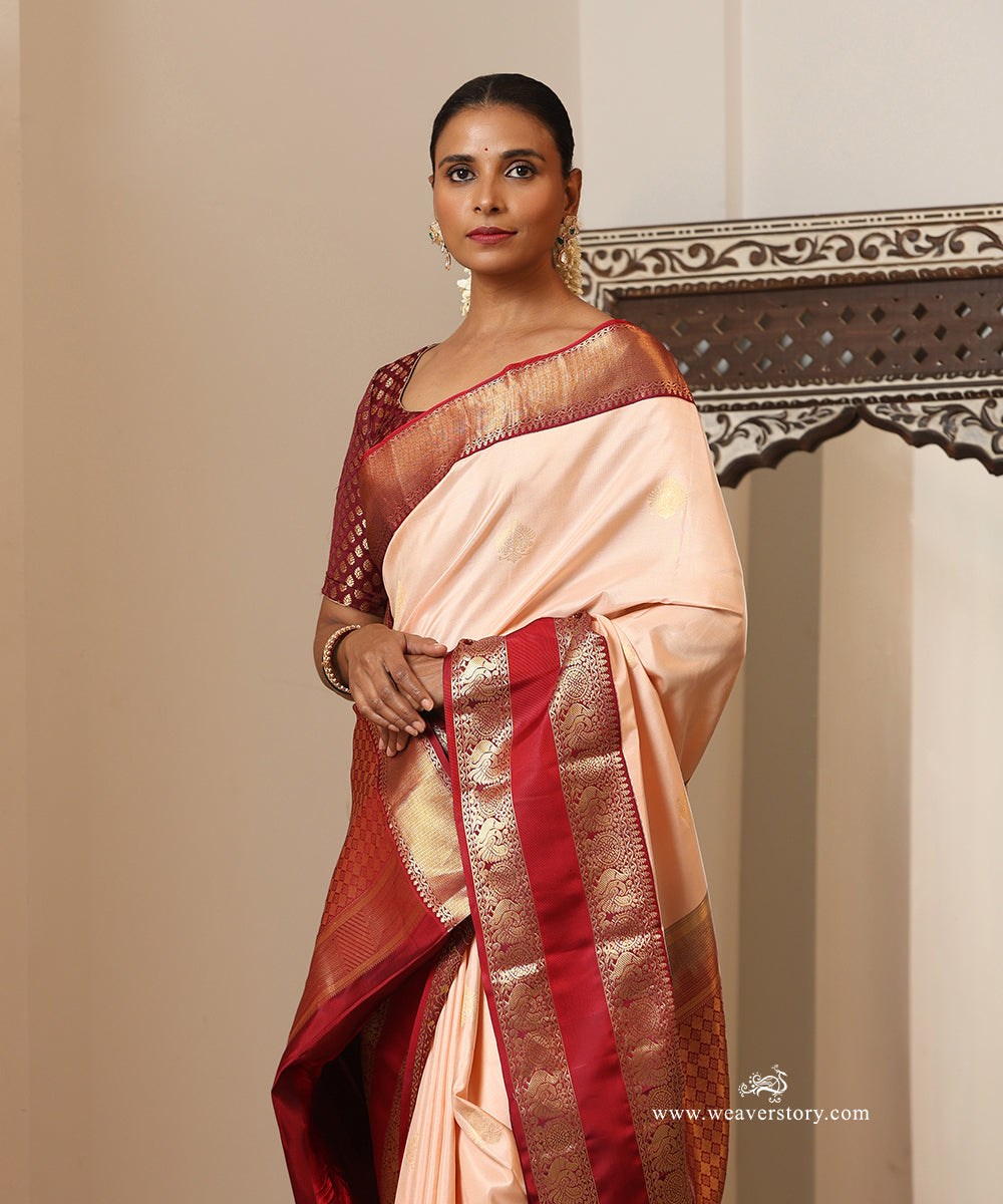 Soft Peach Handloom Pure Silk Kanjivaram Saree With Annapakshi Motifs On Maroon Border